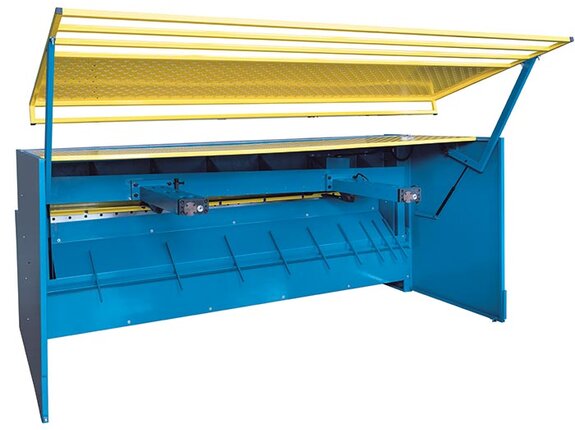 Accessible work area at the back gauge is secured by a swivel door